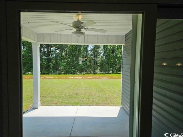 view of patio featuring ceiling fan