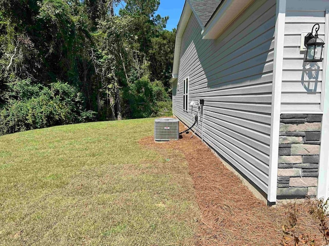 view of yard featuring cooling unit