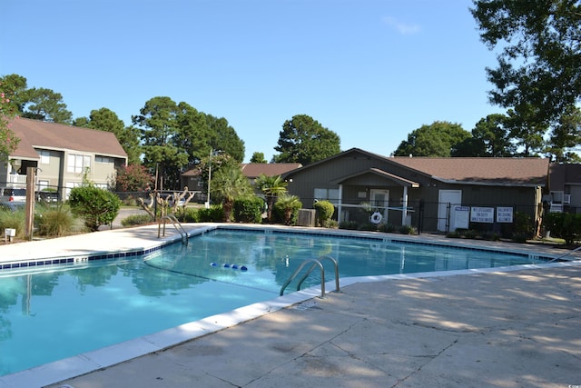 view of swimming pool featuring a patio