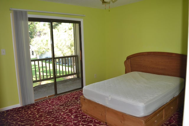 bedroom featuring access to outside and carpet floors