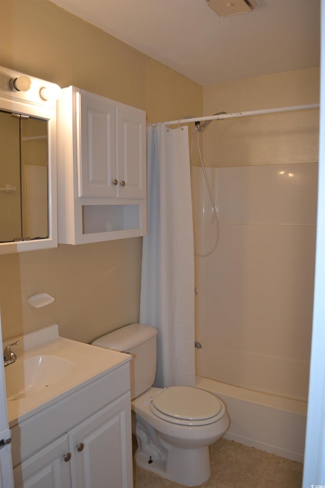 full bathroom featuring vanity, toilet, shower / bath combo, and tile patterned floors