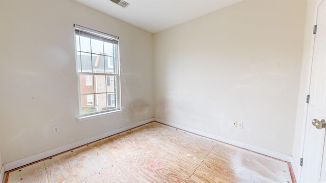 empty room featuring a wealth of natural light