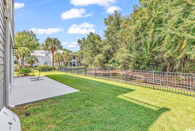 view of yard with a patio area