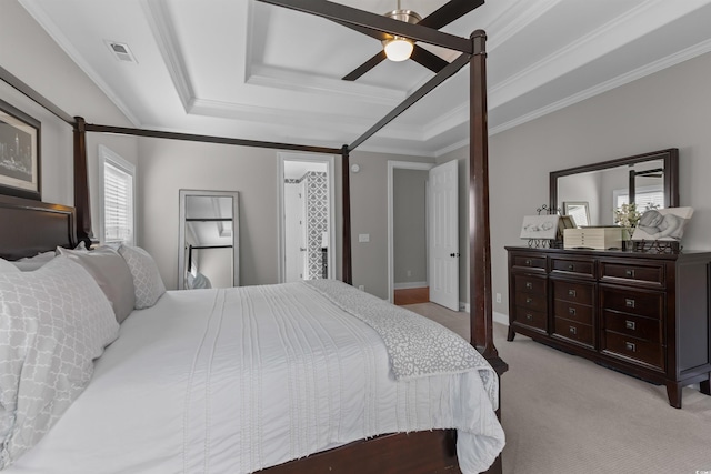bedroom with visible vents, a raised ceiling, ornamental molding, a ceiling fan, and light carpet