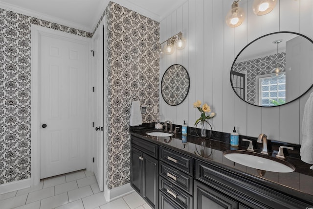 bathroom featuring tile patterned floors, wallpapered walls, double vanity, and a sink