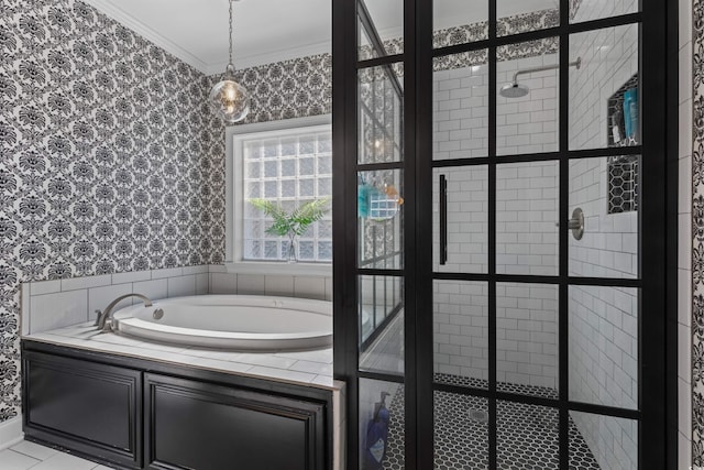 bathroom featuring tiled shower, a garden tub, wallpapered walls, and crown molding