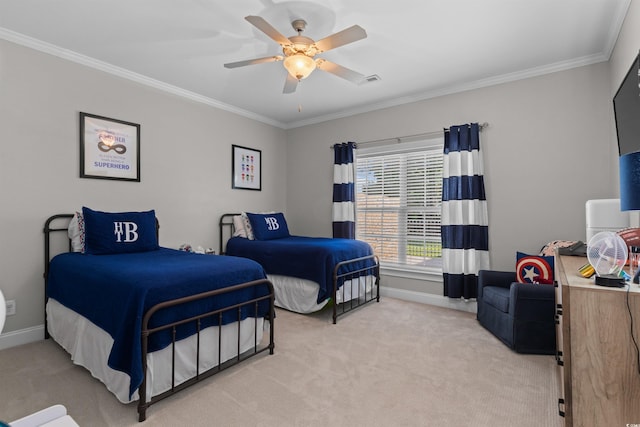 bedroom featuring ceiling fan, light colored carpet, and crown molding