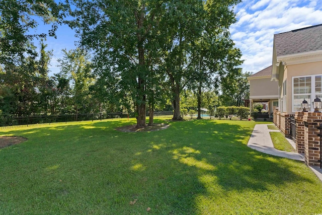 view of yard featuring a fenced backyard