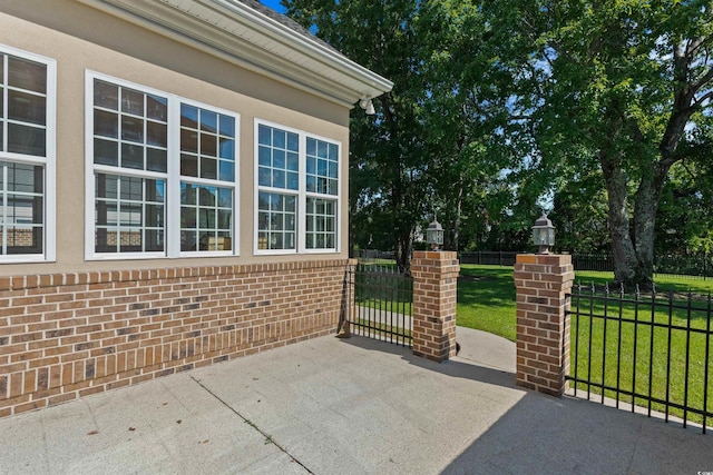 view of patio with fence