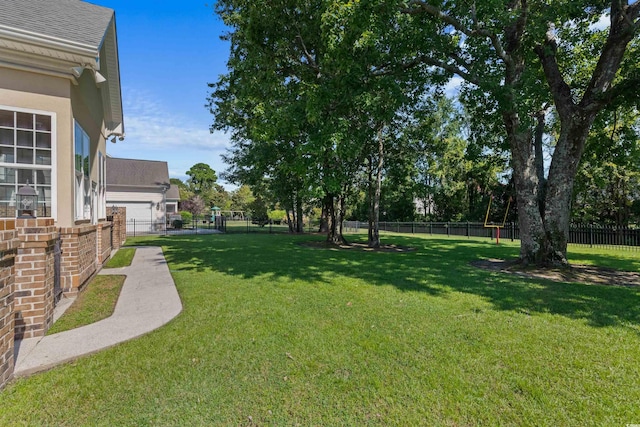 view of yard with a fenced backyard