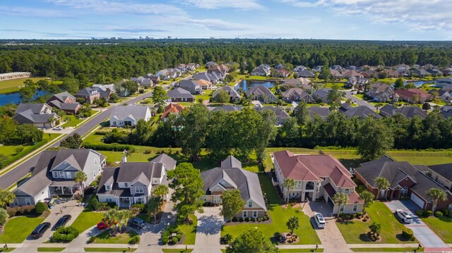 birds eye view of property featuring a residential view and a water view