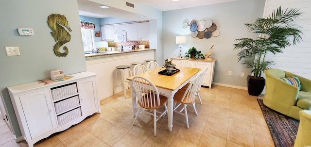 view of tiled dining space