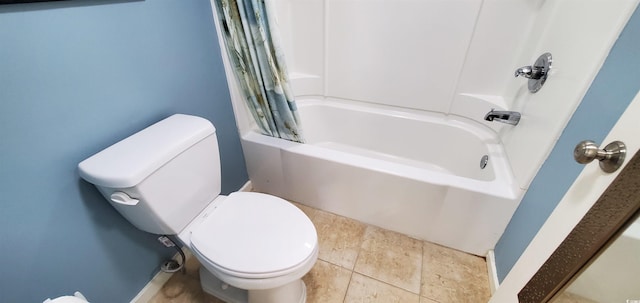 bathroom with tile patterned floors, toilet, and shower / bathtub combination with curtain