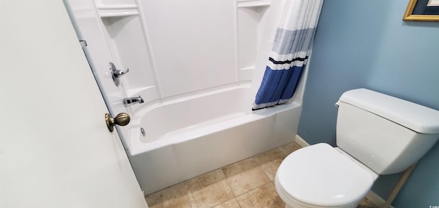 bathroom with toilet and shower / bathtub combination with curtain