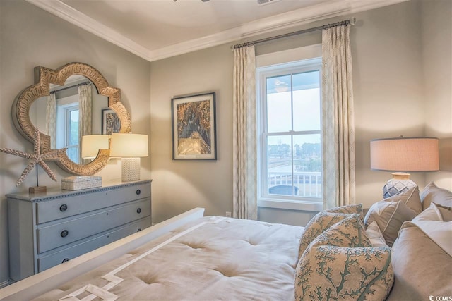 bedroom with ornamental molding