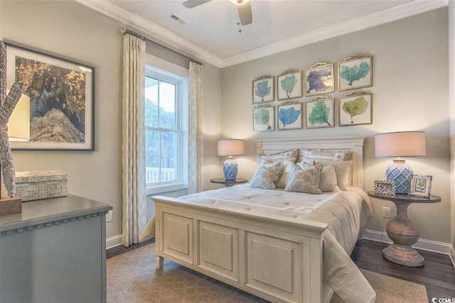 bedroom featuring ornamental molding, ceiling fan, and dark hardwood / wood-style floors