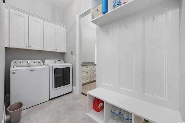 laundry area featuring cabinets and separate washer and dryer