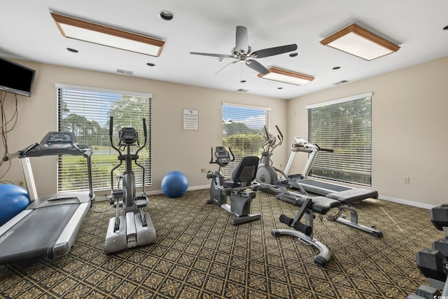 exercise room featuring ceiling fan