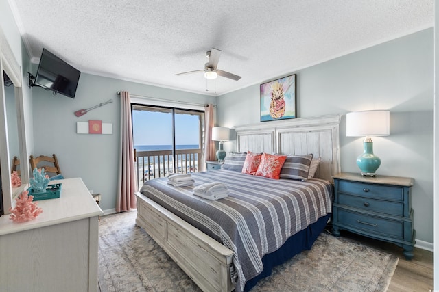 bedroom with light wood-type flooring, a textured ceiling, ceiling fan, and access to exterior