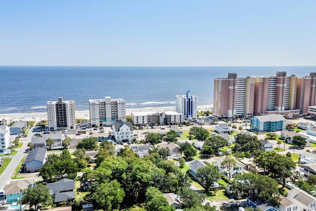 drone / aerial view with a view of the beach and a water view