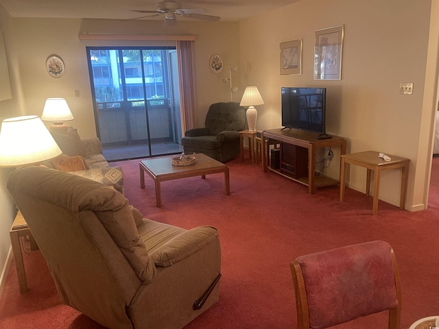 carpeted living room with ceiling fan