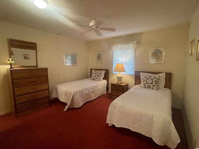 bedroom with dark carpet and ceiling fan