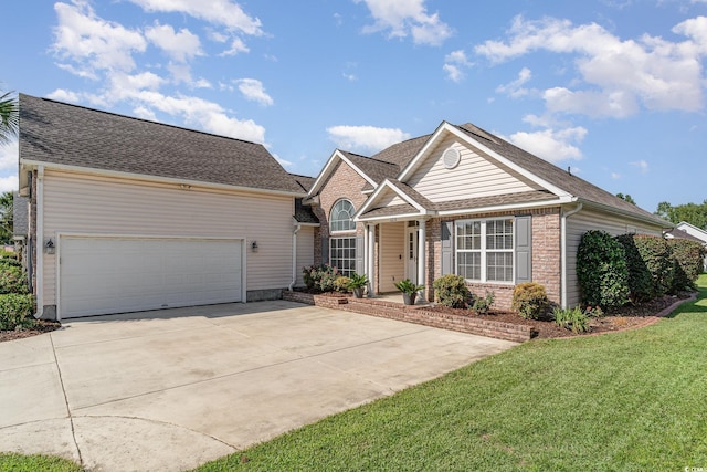 ranch-style house featuring a garage and a front lawn