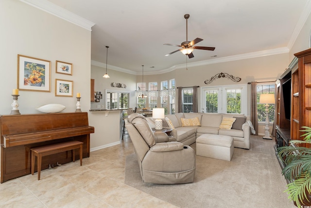 tiled living room with ornamental molding and ceiling fan