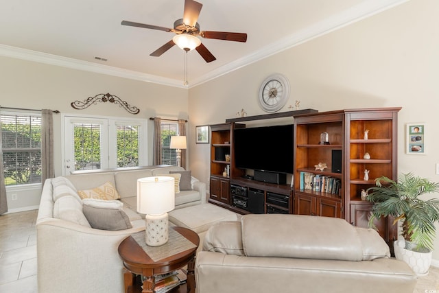 tiled living room featuring ornamental molding, plenty of natural light, and ceiling fan