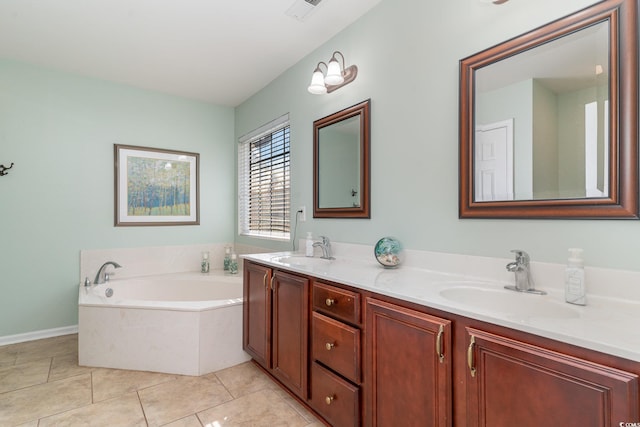 bathroom with vanity, tile patterned floors, and a tub to relax in