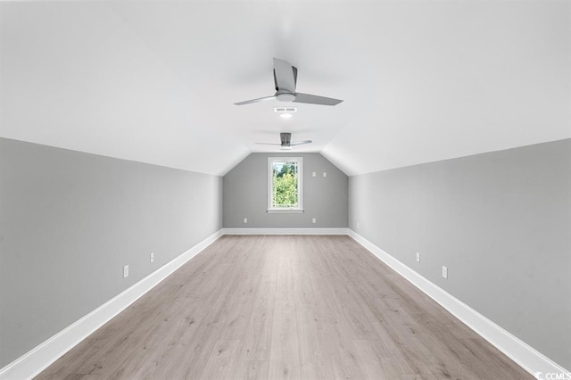 bonus room with lofted ceiling, ceiling fan, and light hardwood / wood-style floors