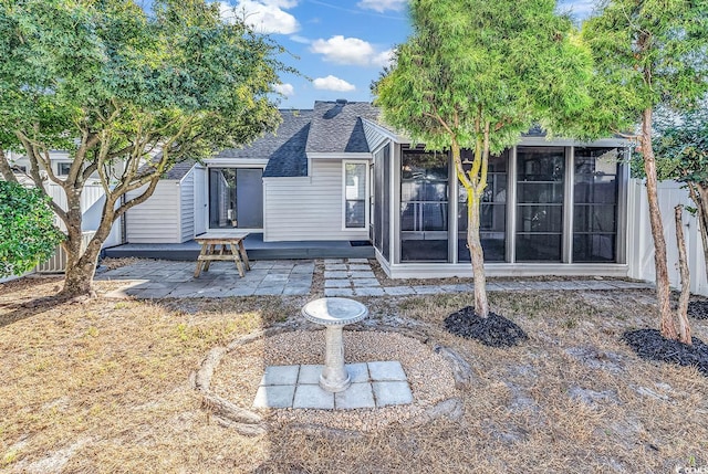 rear view of house featuring a patio area