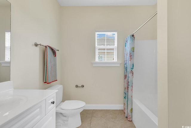 full bath featuring toilet, vanity, baseboards, and tile patterned floors