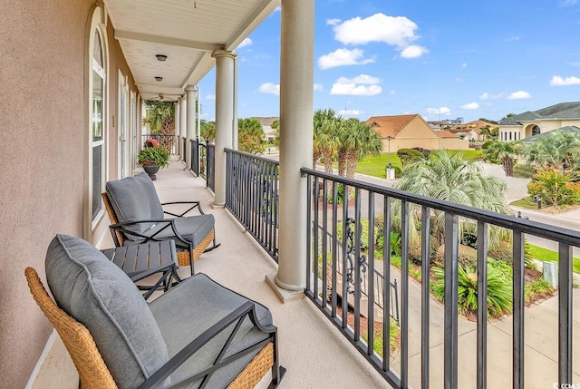 balcony featuring a residential view