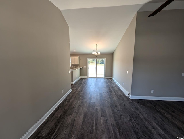 TBD1 Mineral Springs Rd, Conway, SC 29527 - unfurnished living room with a chandelier, dark wood finished floors, baseboards, and lofted ceiling
