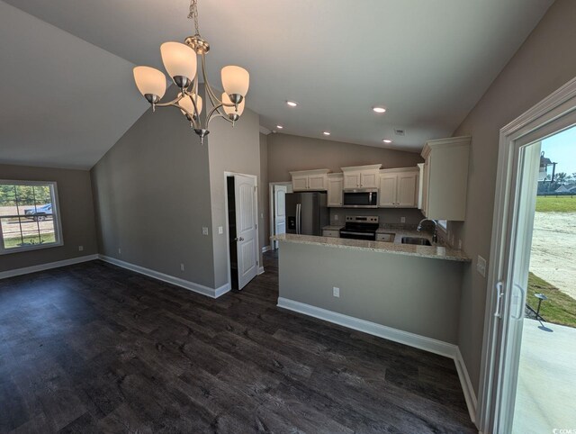 TBD1 Mineral Springs Rd, Conway, SC 29527 - kitchen with appliances with stainless steel finishes, lofted ceiling, white cabinetry, dark wood-type flooring, and a chandelier
