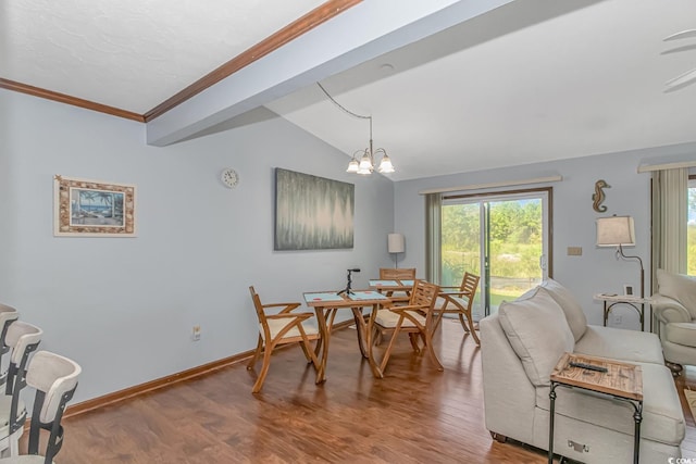 305 Resort Dr Unit C12, Myrtle Beach, SC 29588 - dining room with plenty of natural light, wood finished floors, a chandelier, vaulted ceiling, and crown molding