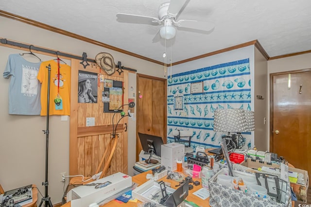 misc room featuring crown molding and ceiling fan