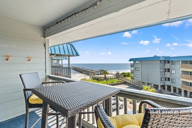 balcony featuring a water view