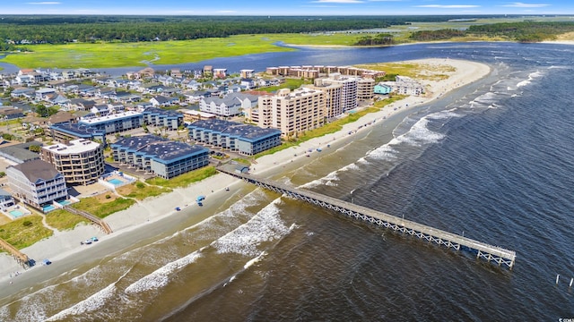 aerial view featuring a water view and a view of the beach