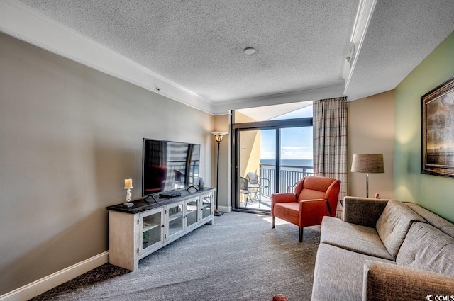 carpeted living area with a textured ceiling, crown molding, and baseboards