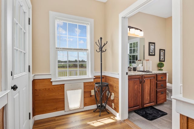 interior space with light hardwood / wood-style flooring and heating unit