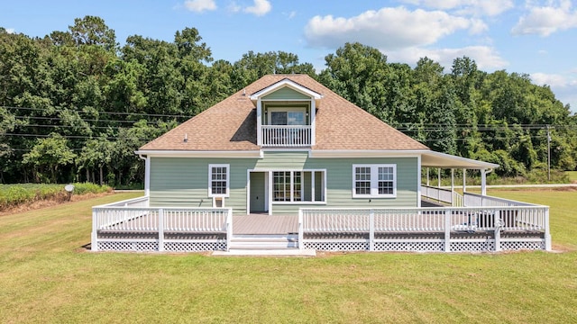 back of house with a yard and a deck