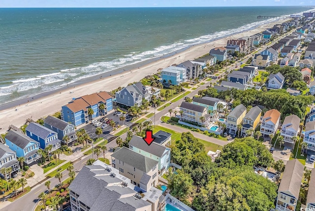 bird's eye view with a beach view and a water view