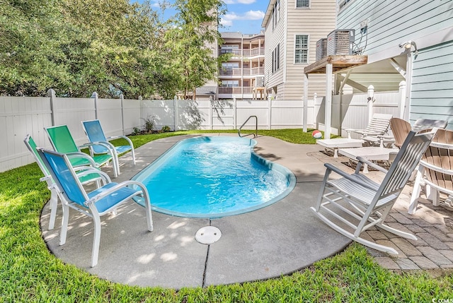 view of swimming pool featuring a patio