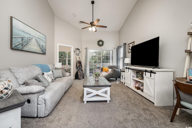 living room with high vaulted ceiling, carpet, and ceiling fan