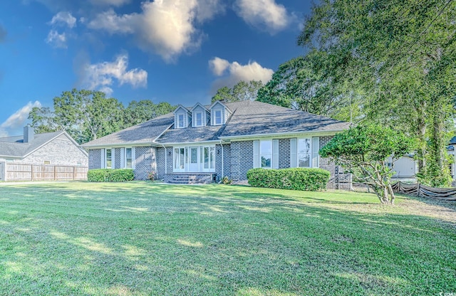 view of front of home with a front yard