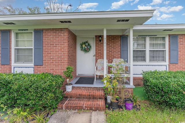 property entrance with a porch