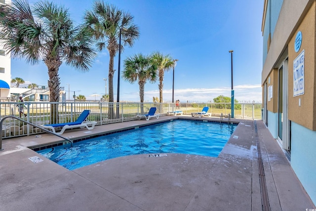 view of pool with a patio