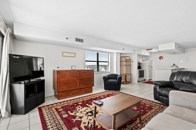 living room featuring light tile patterned floors